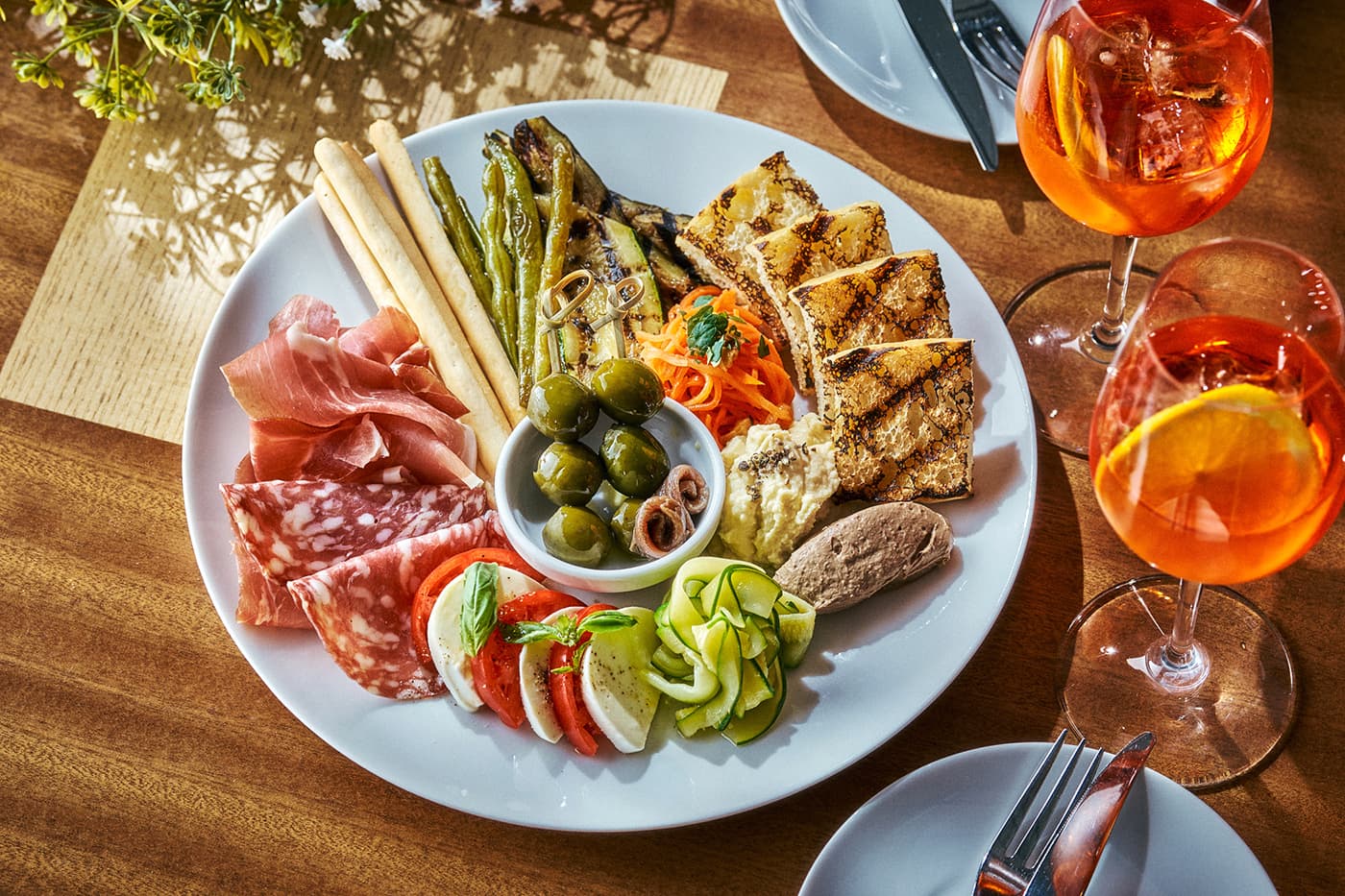 [May Exclusive] Experience Antipasti and Free-flow Aperol Spritz on our Outdoor Terrace